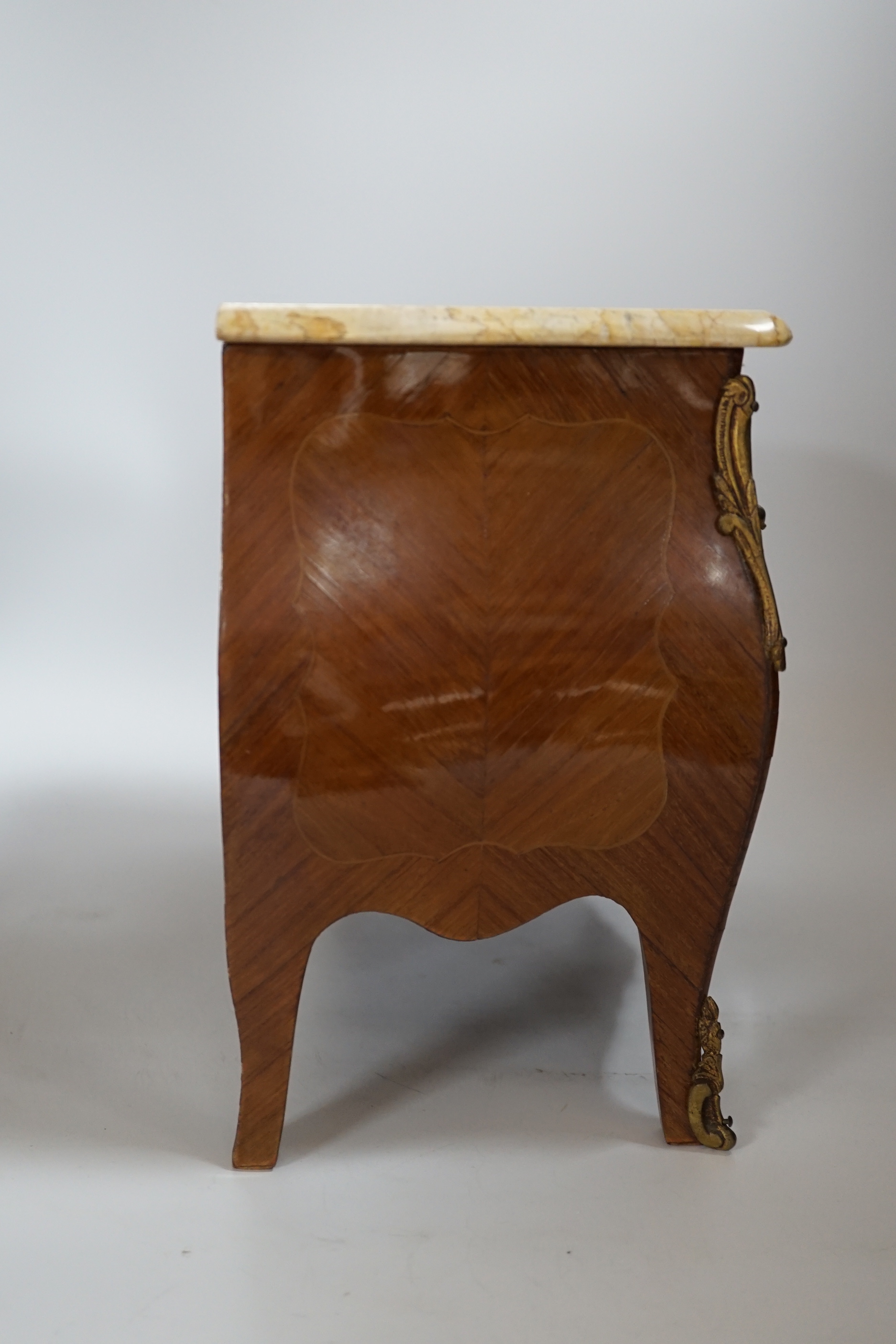 A 19th century miniature French marble topped kingwood marquetry serpentine commode, 34cm